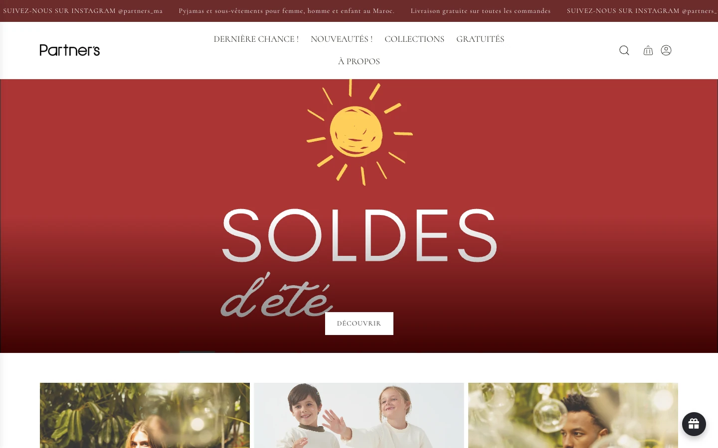 The Partner’s homepage on a desktop screen: a scrolling burgundy announcement bar, the Partner’s wordmark above a centred French navigation, and a deep red hero with a drawn sun and the headline “SOLDES d’été” over a “Découvrir” button, with three lifestyle photographs beginning below.